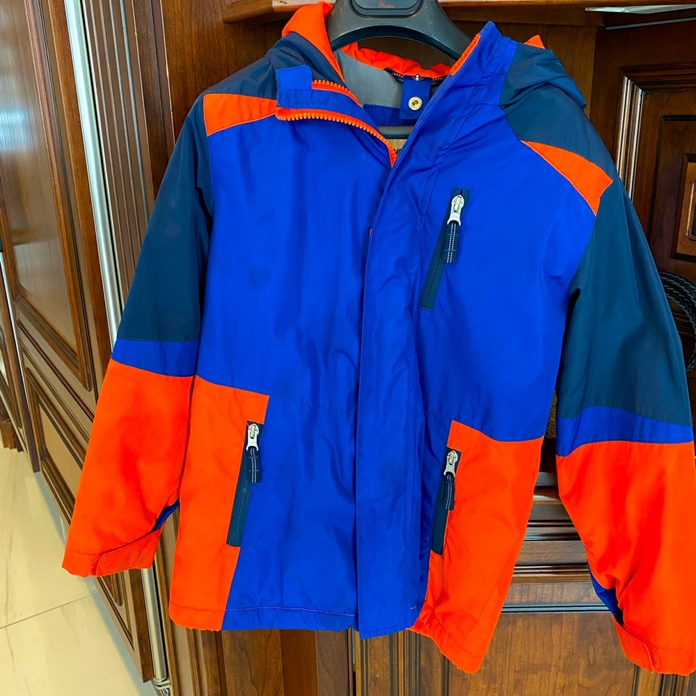 Like new Lands End winter jacket.  Rick orange and cobalt blue colors. Hoodie.